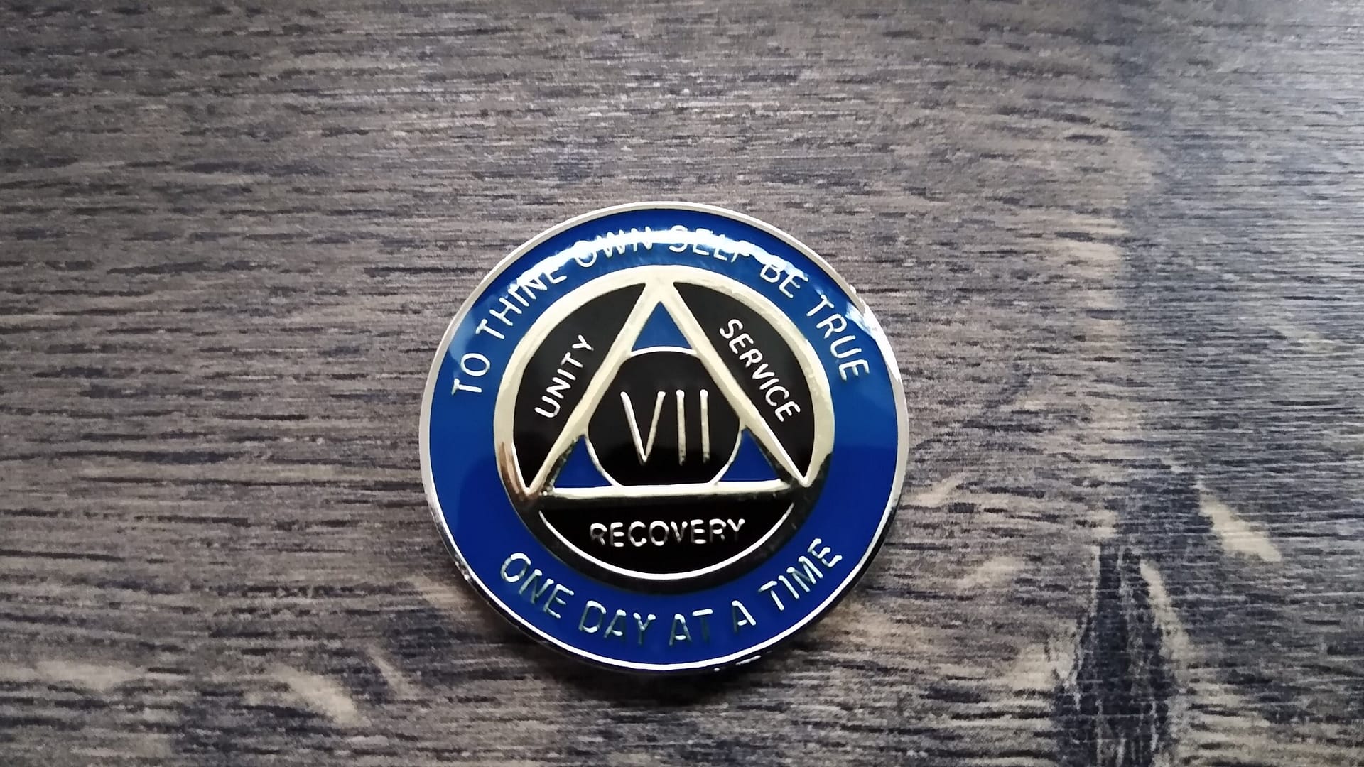 AA mønt 7 år, tri-plate