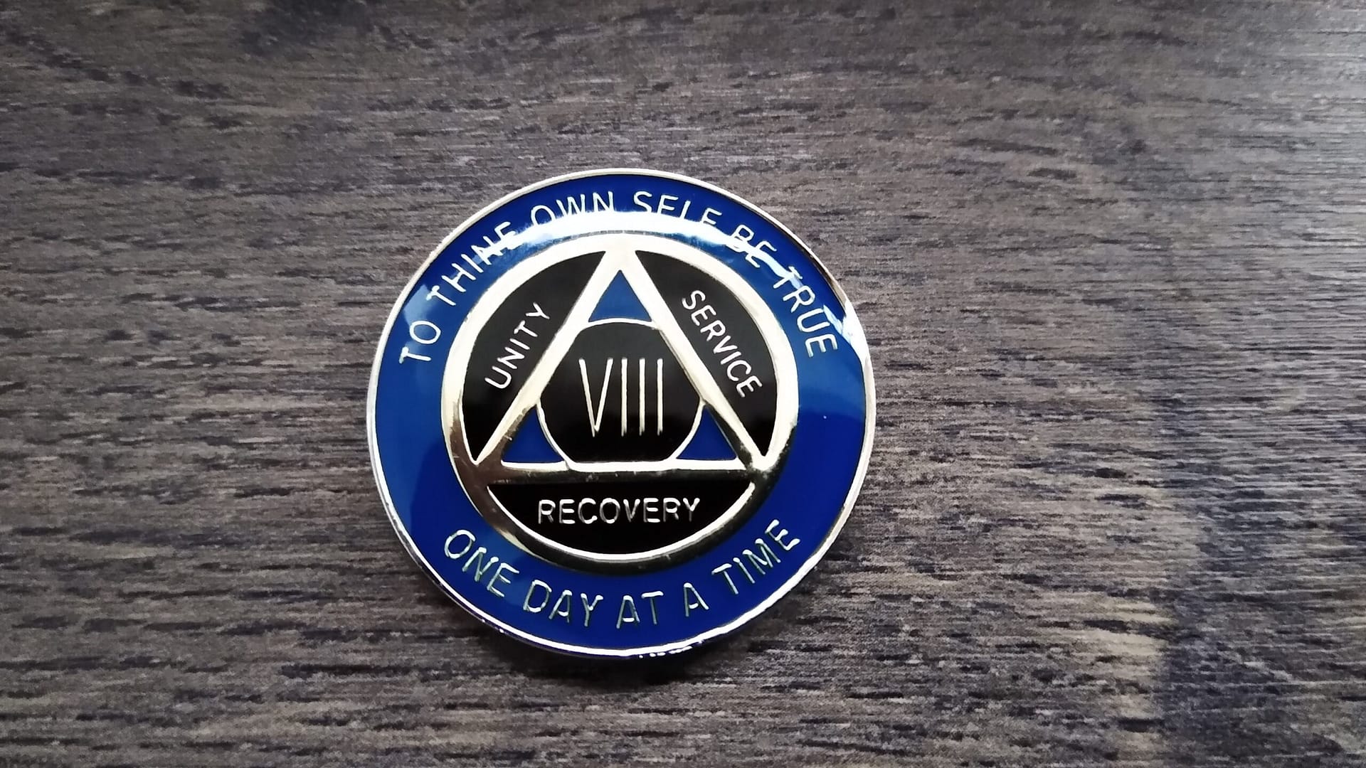 AA mønt 8 år, tri-plate