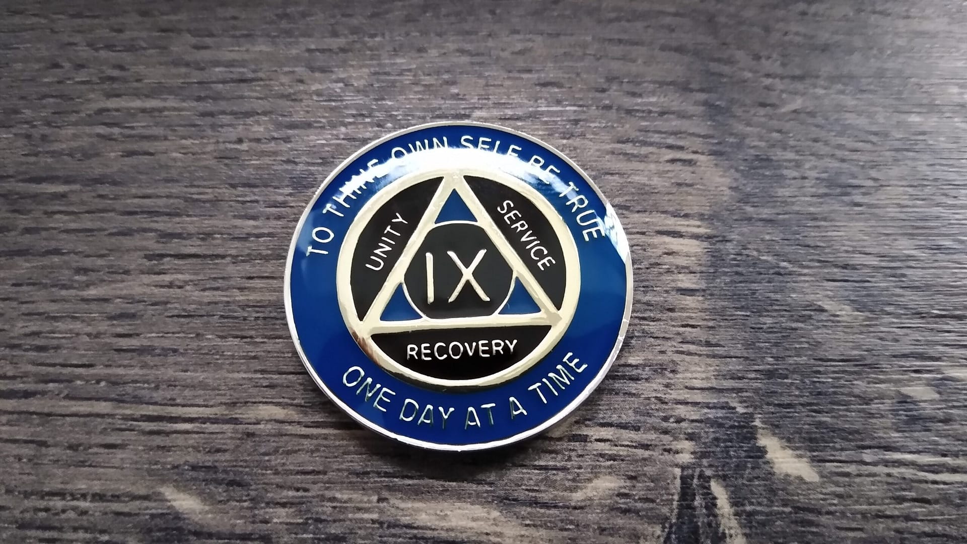 AA mønt 9 år, tri-plate