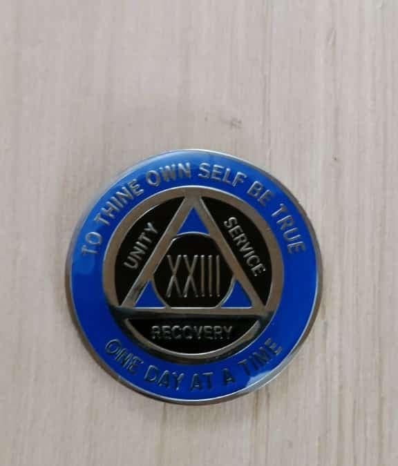 AA mønt 23 år, tri-plate