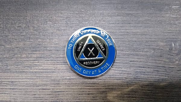 AA mønt 10 år, tri-plate